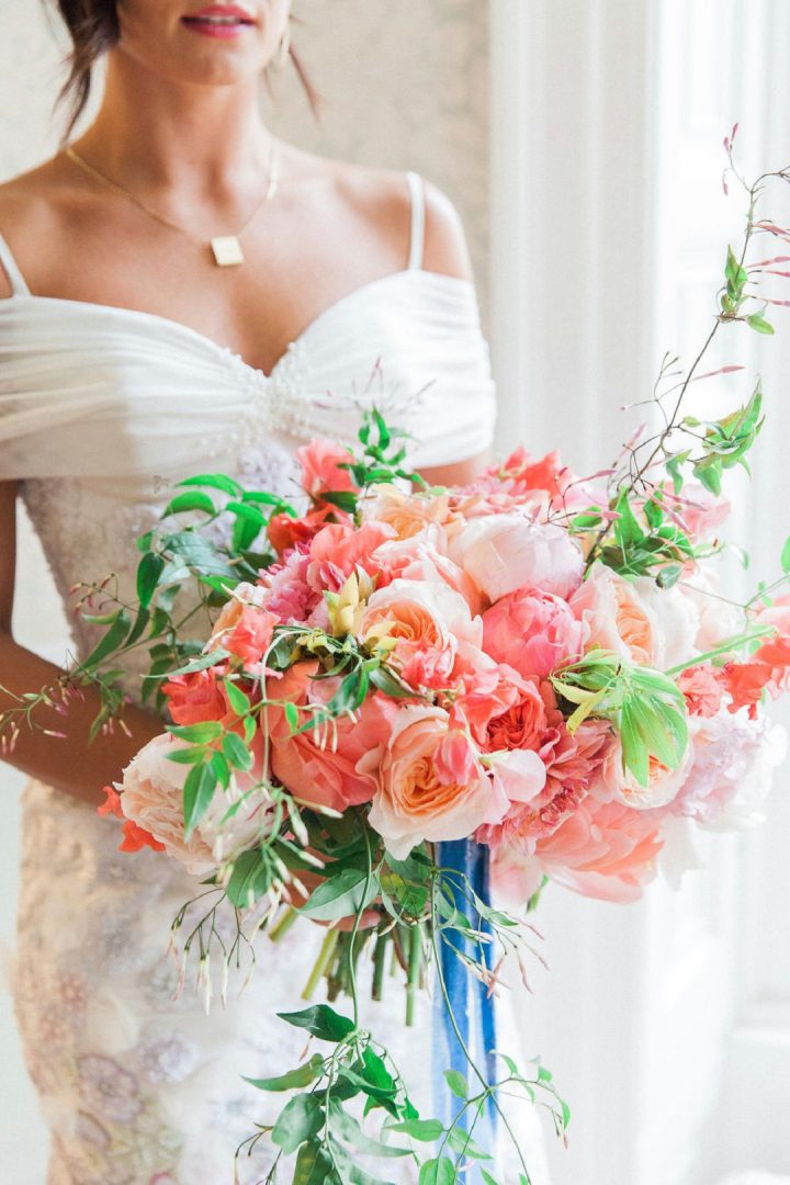 peony wedding bouquet being held by bride