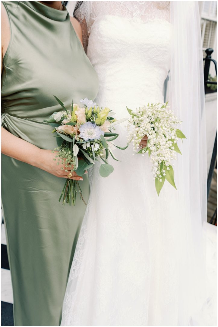 bride holding delicate lily of the valley bouquet Chiswick House Wedding