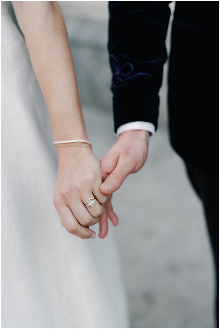 bride and groom holding hands at Chiswick House Wedding
