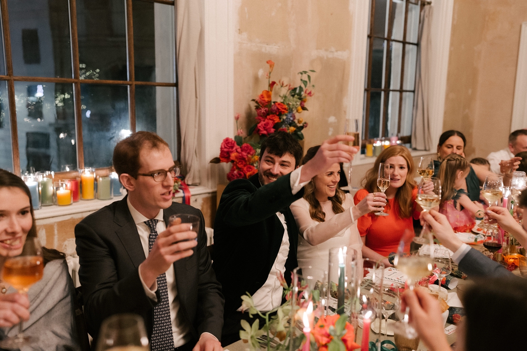 bride and groom giving toast at Old Sessions House wedding